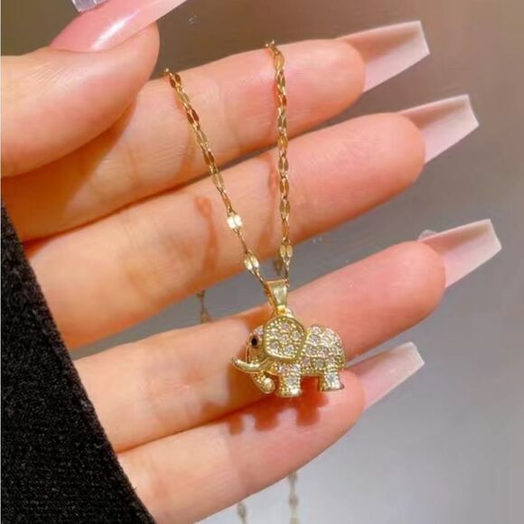 Stainless Steel Elephant Pendant Necklace in Gold Tones and embedded Zirconia - Picture 3 of 11